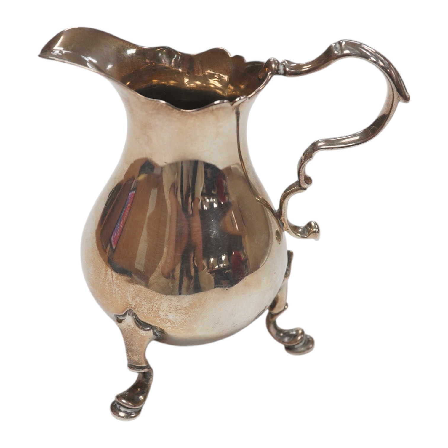 A mid 18th century silver cream jug, indistinct marks, 92mm, 3.3oz. Condition - fair